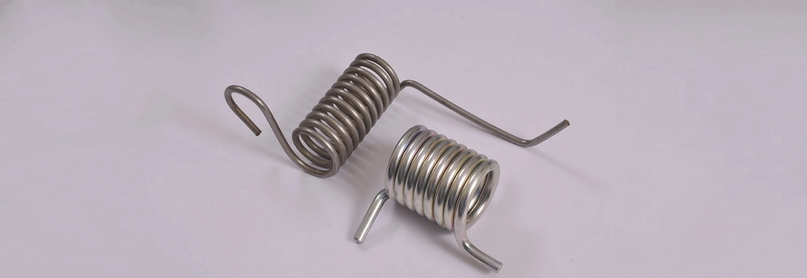 SPRING FOR CHAIN DELIVERY BAR