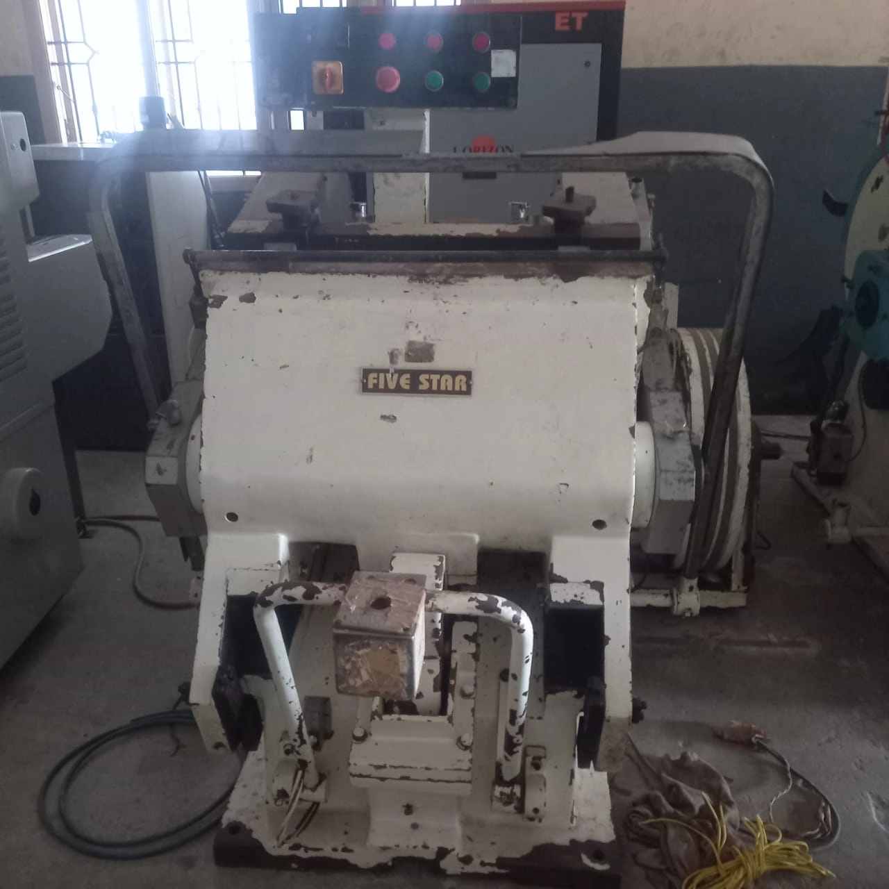 PUNCHING AND EMBOSSING MACHINE